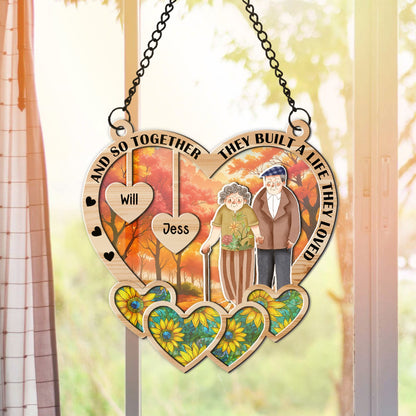 Personalized Old Couple And So Together They Built A Life That They Loved Hanging Suncatcher Ornament