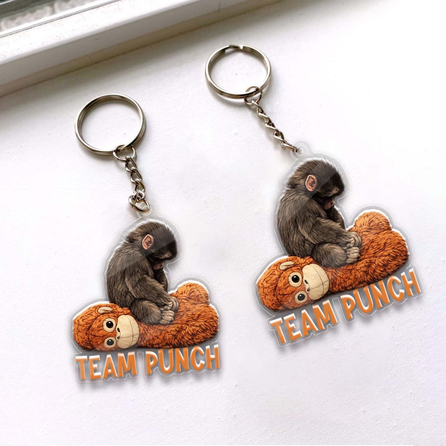 Team Punch Baby Monkey Acrylic Keychain